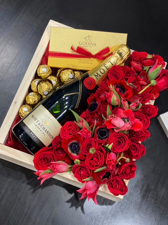 Wooden Box With Red Flowers Chocolates And Moet Champagne